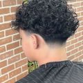 Coupe taper cheveux bouclés